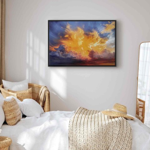 Obraz - Piękny zachód słońca - chmury w ciepłych odcieniach 120x80 W ramie drewnianej czarnej