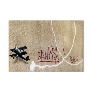 Obraz - Samolot Banksy (1-częściowy) - graffiti czerwone napisy na tle muralu 120x80 Premium Print