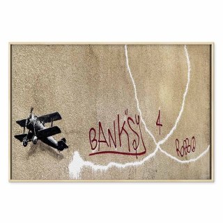 Obraz - Samolot Banksy (1-częściowy) - graffiti czerwone napisy na tle muralu 60x40 W ramie drewnianej naturalnej
