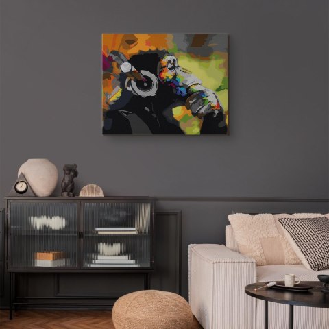 Obraz do samodzielnego malowania - Kolorowa małpa w słuchawkach 50x40